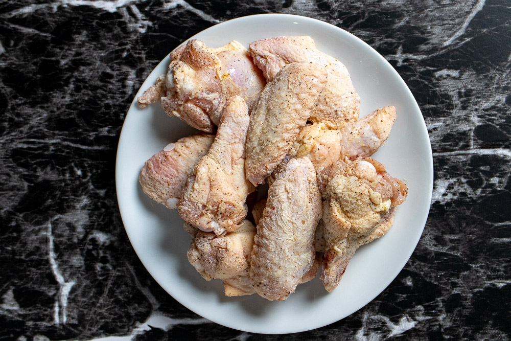 Chinese chicken wings tossed in seasoned baking powder