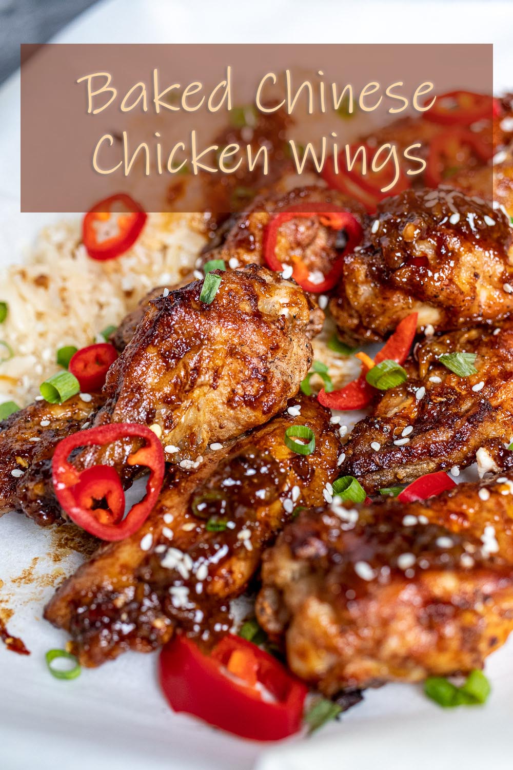 Chinese chicken wings and fried rice on parchment