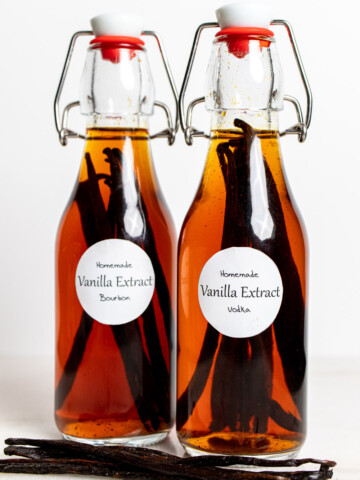 two swing top bottles of homemade vanilla extract