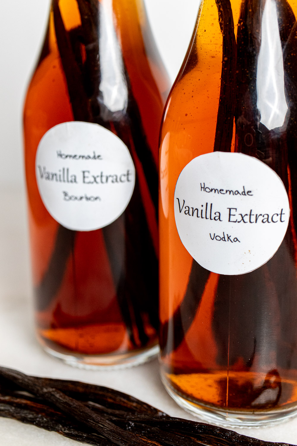 close up of homemade vanilla extract bottles