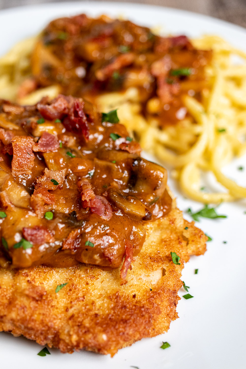 close up of jagerschnitzel with spaetzle
