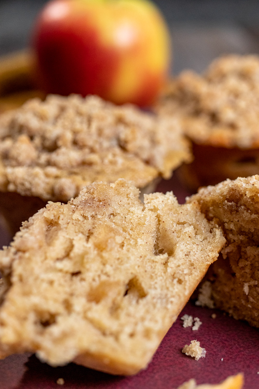 close up of cut cinnamon apple cider muffin