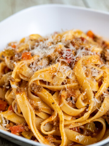 bowl of authentic Bolognese served with tagliatelle