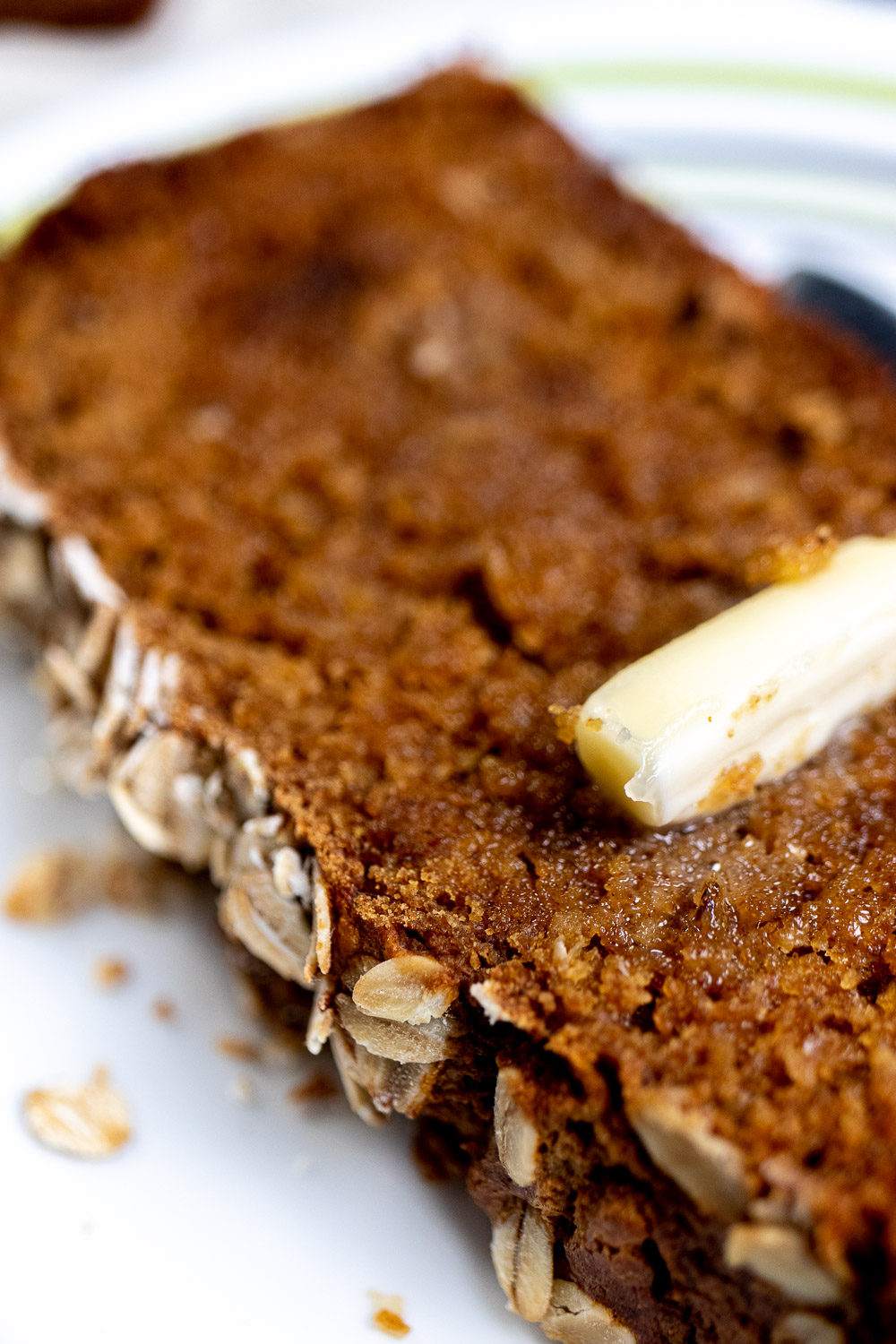 close up of a buttered slice of Irish Guinness brown bread