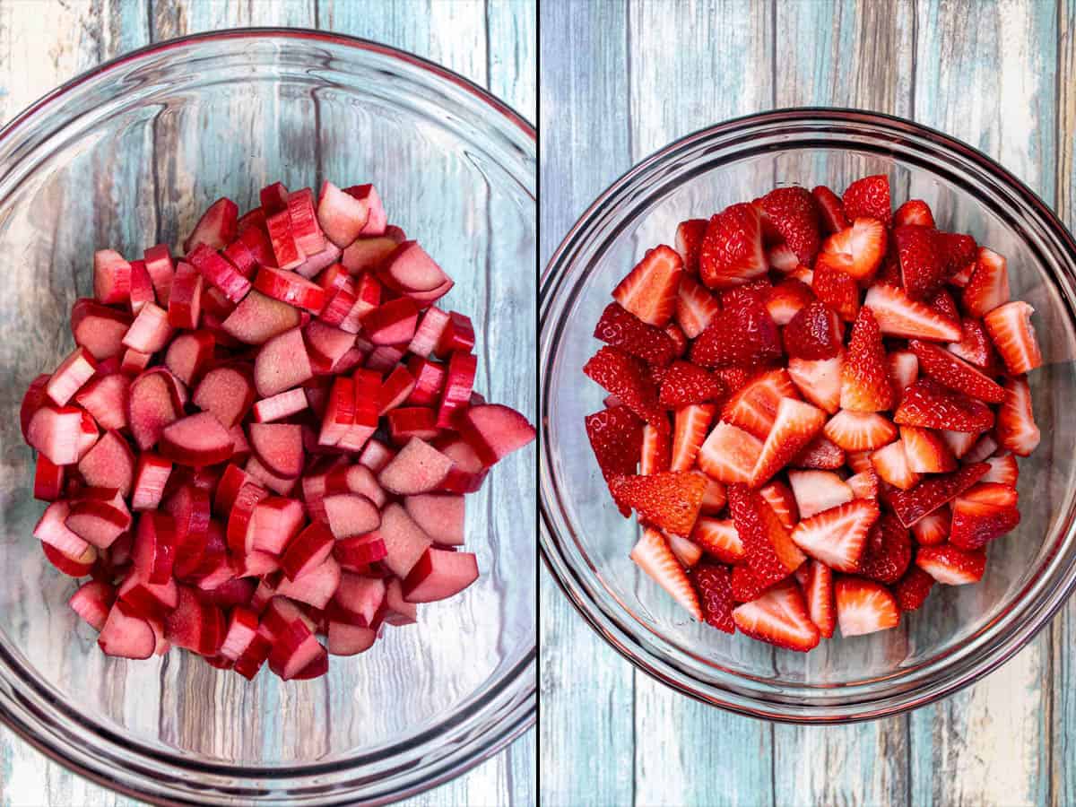 Two glass bowls, left bowl filled with chopped rhubarb and the right bowl filled with sliced strawberries.