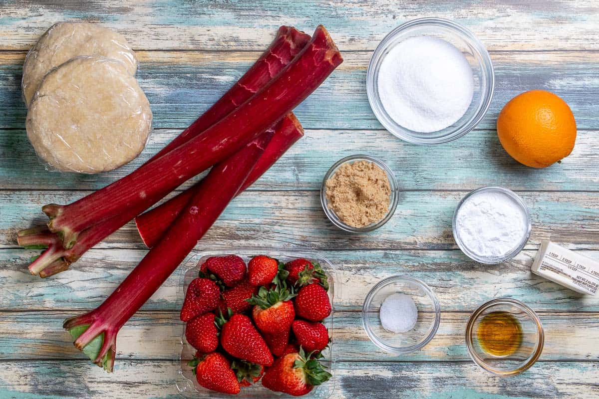 Ingredients for making strawberry rhubarb pie.