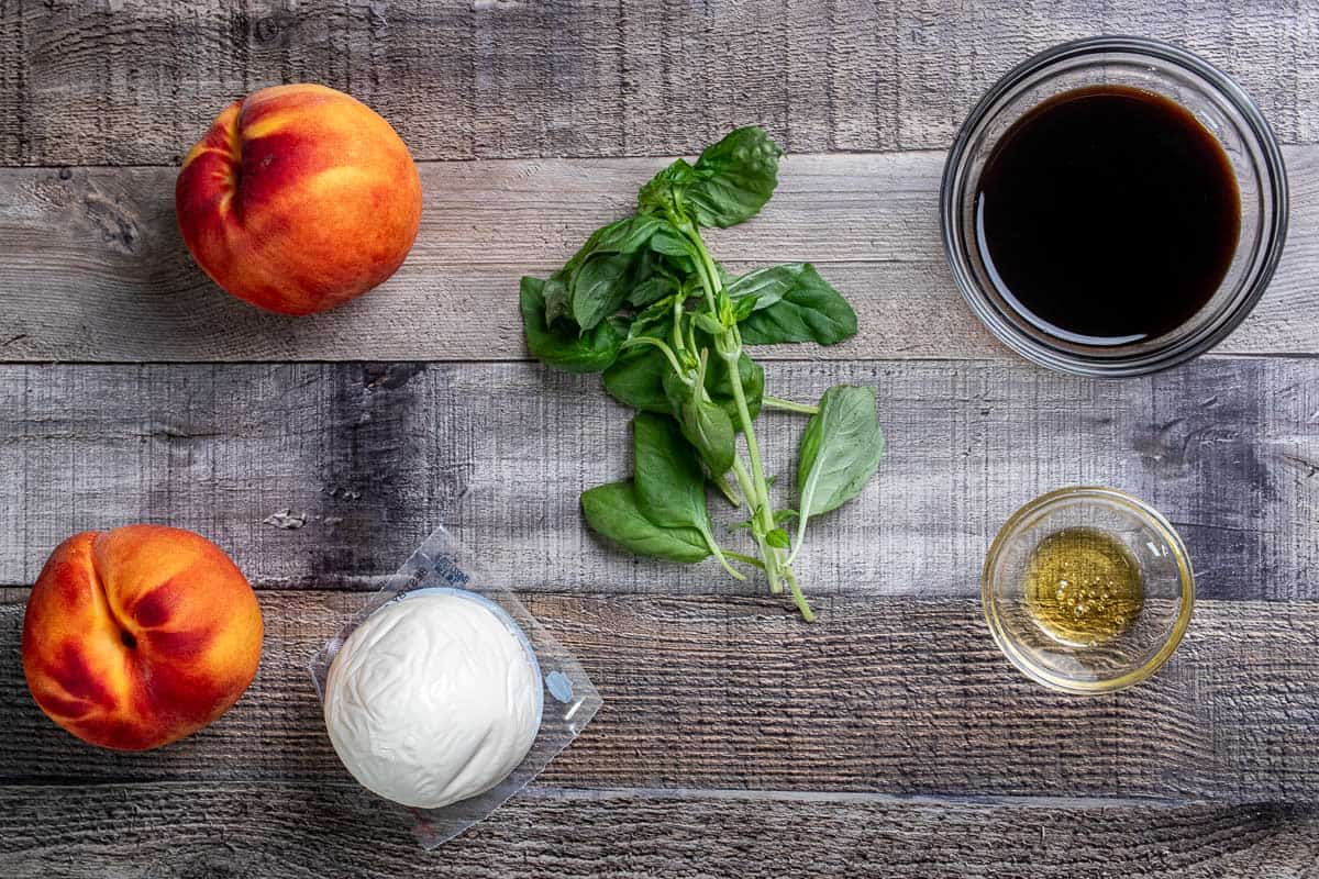 The 5 ingredients for a peach caprese salad with balsamic and honey reduction