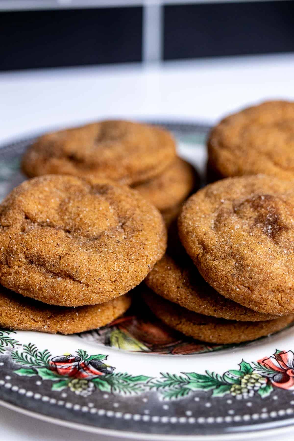 Close up of gingerbread snickerdoodles on a Christmas plate.