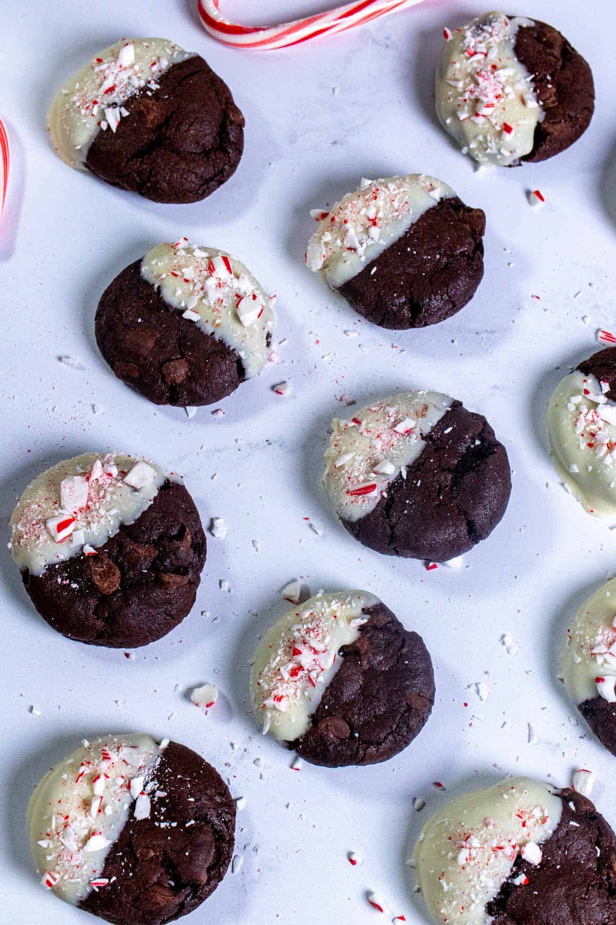 Overhead view of white chocolate peppermint mocha cookies on marble.
