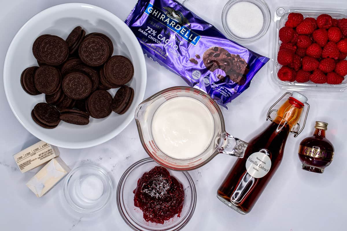 Ingredients for making a chocolate raspberry tart with Chambord whipped cream.