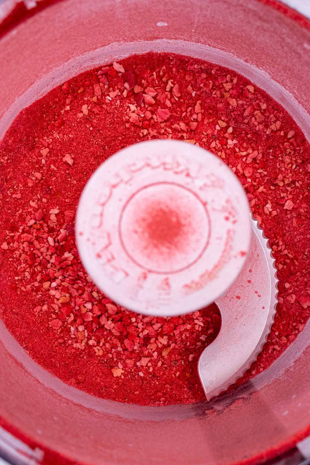 Freeze-dried strawberries reduced to powder in a food processor.