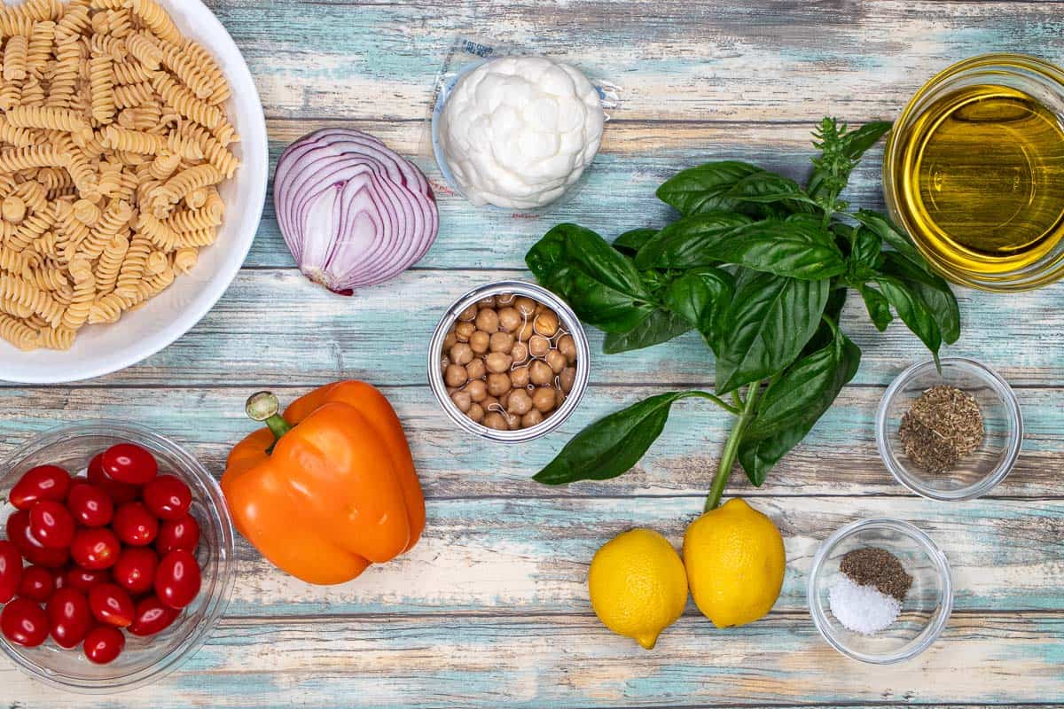 Ingredients for an easy and vegetarian summer pasta salad.