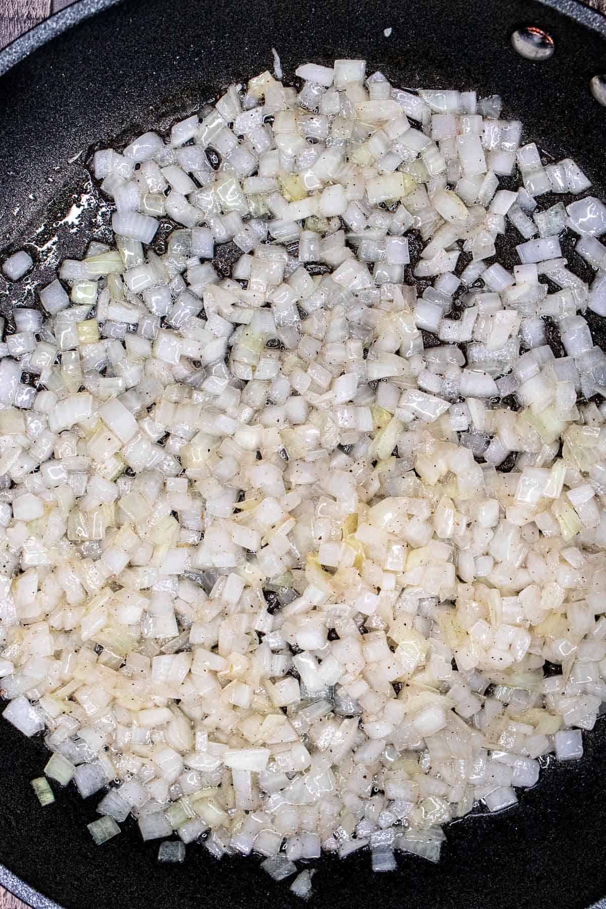 Diced onion sauteed in bacon fat.