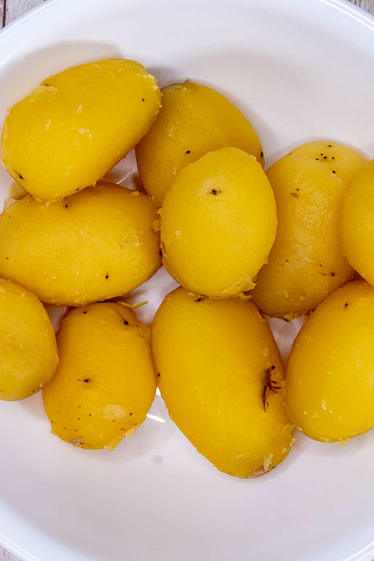 Par-boiled potatoes peeled.