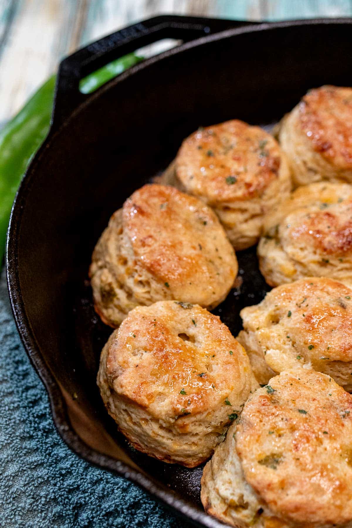 Baked Hatch chile biscuits in a cast iron skillet.