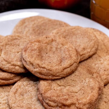 A plate full of apple cider snickerdoodle cookies.