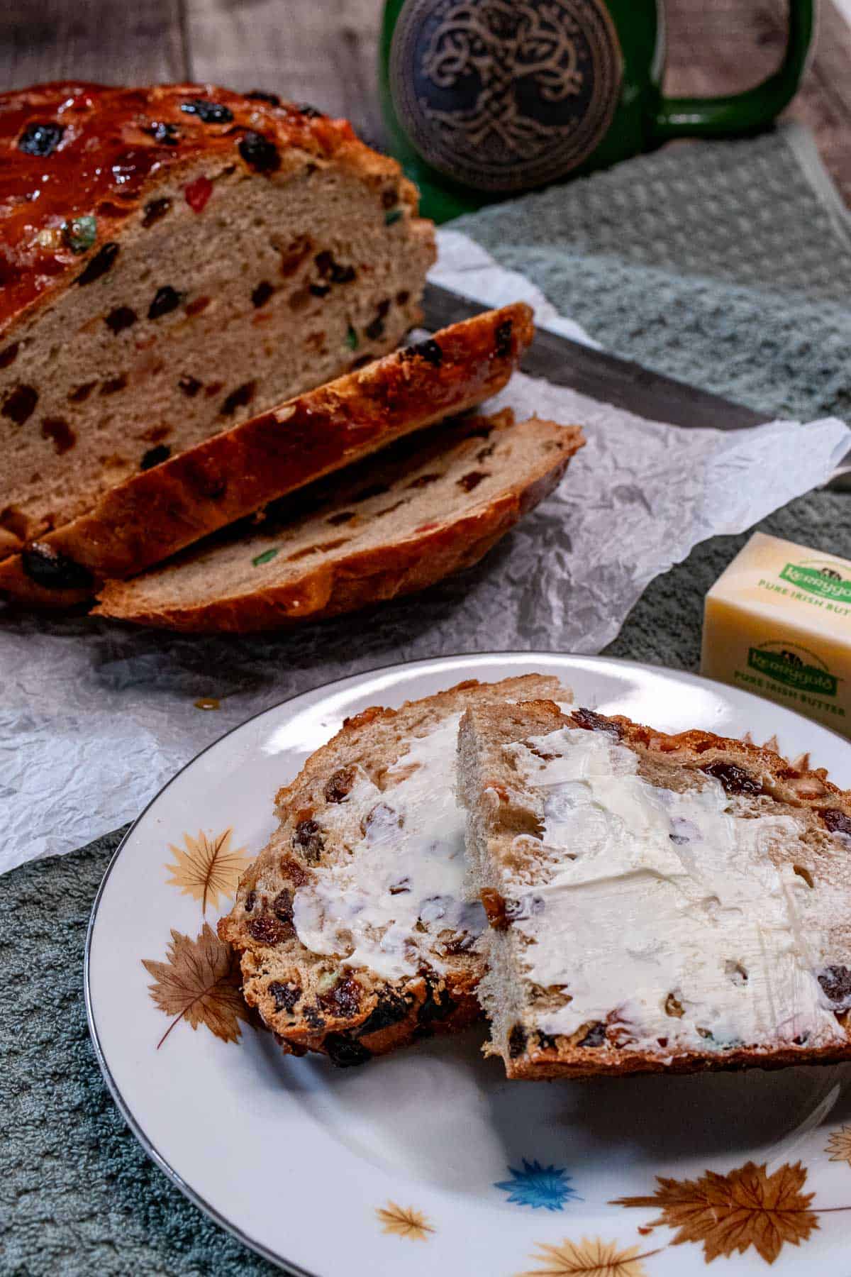 Sliced Irish barmbrack served with Irish butter.