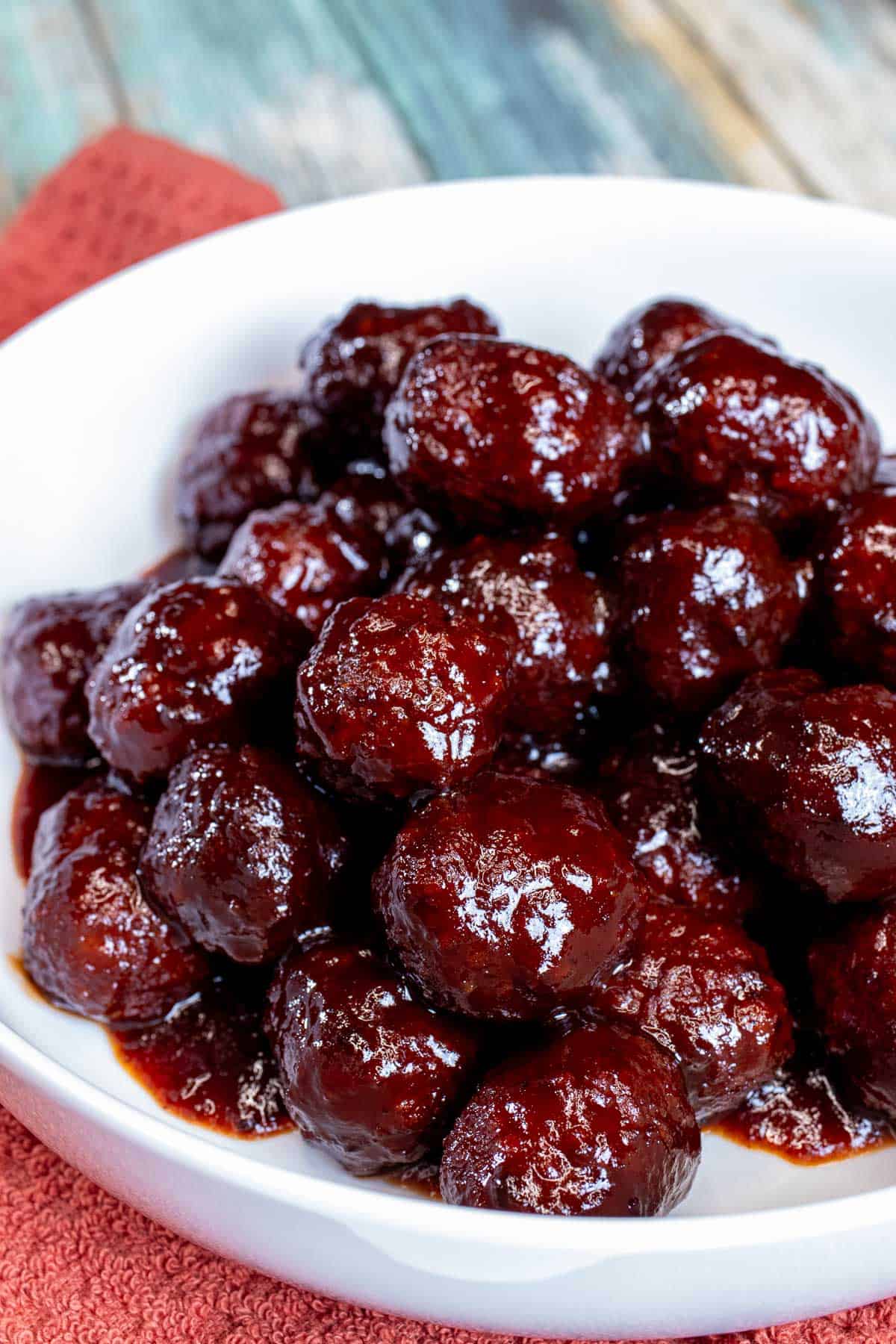 A bowl of blackberry chipotle cocktail meatballs.