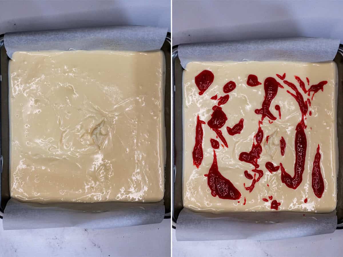 Layering white cheesecake batter into prepared pan and drizzling in raspberry sauce.