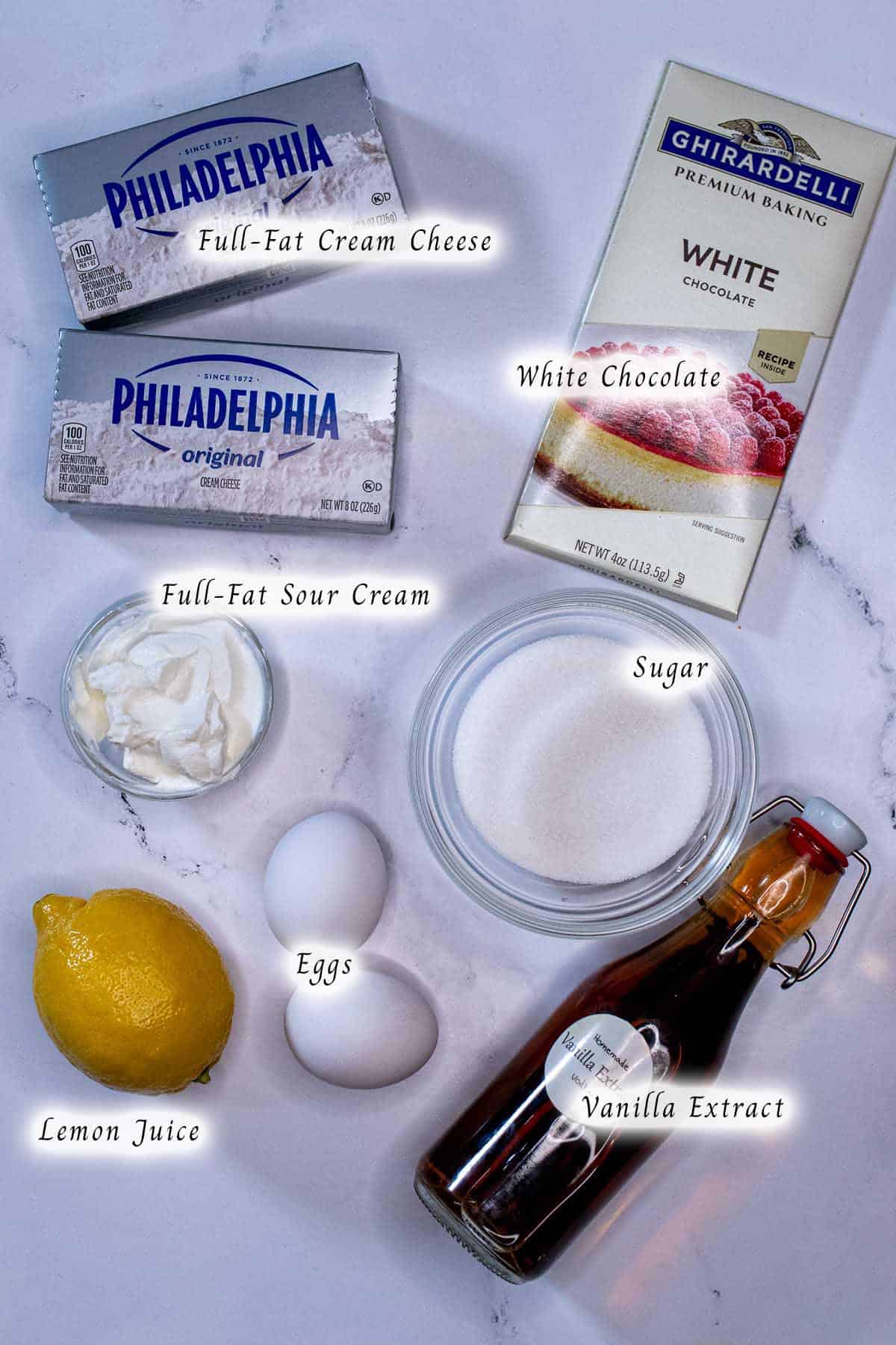 Ingredients for making white chocolate cheesecake filling.