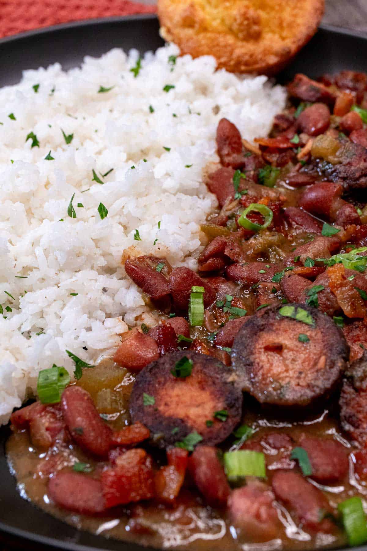 Red beans with pork, served with white rice and a corn muffin.