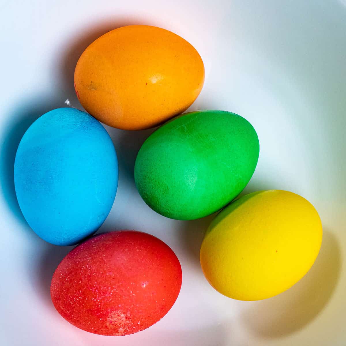 Dyed eggs in a bowl.